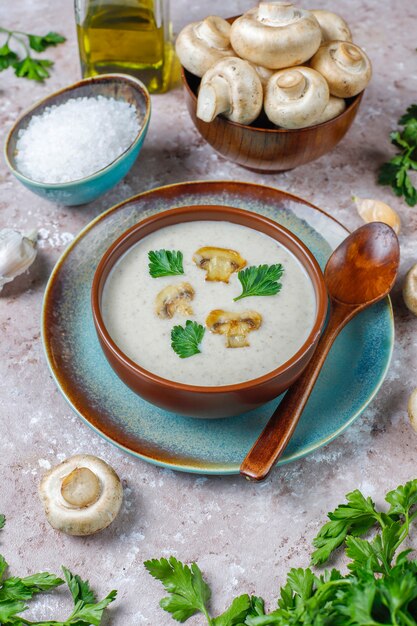 Free Photo delicious homemade mushroom cream soup,top view