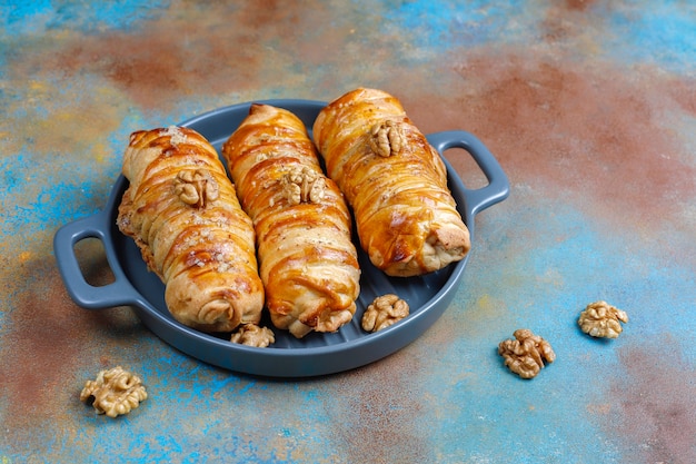 Free photo delicious homemade walnut rolls.