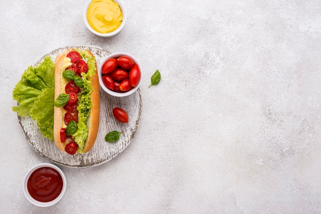 Free Photo delicious hot dog on plate top view