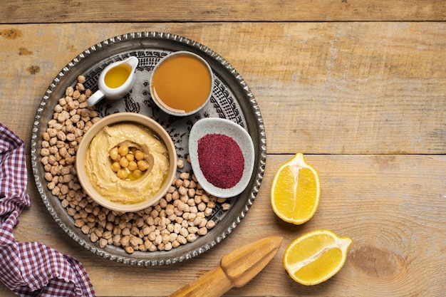 Free Photo delicious hummus on plate still life flat lay