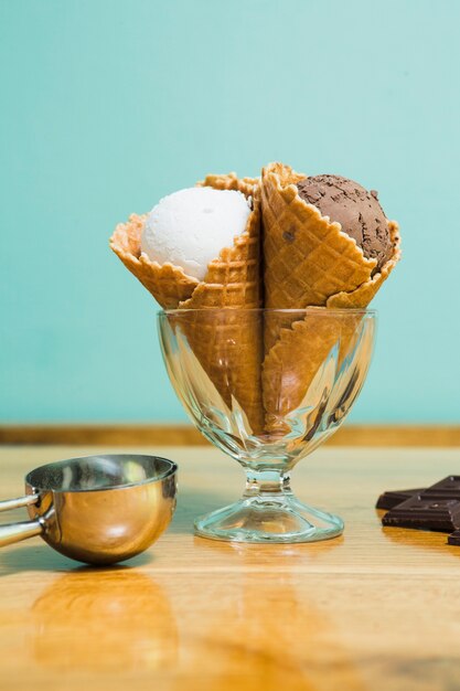 Delicious ice cream cups in bowl