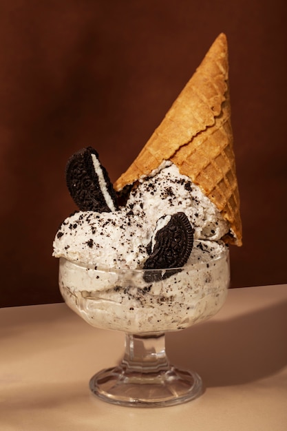 Delicious ice cream with cookies in glass