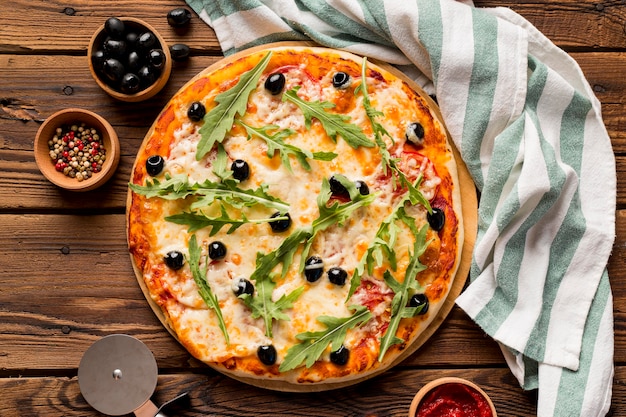 Delicious italian pizza on wooden table