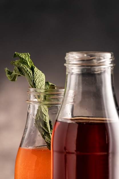 Free photo delicious kombucha bottles arrangement