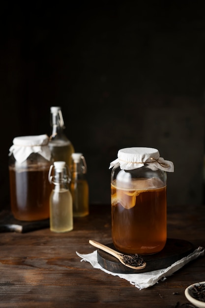 Free Photo delicious kombucha bottles and jars arrangement