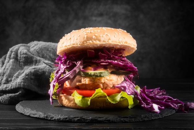 Free Photo delicious looking hamburger on black plate