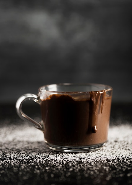 Delicious melted chocolate in a transparent cup