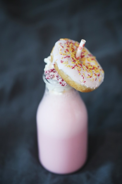 Free photo delicious milkshake with donut