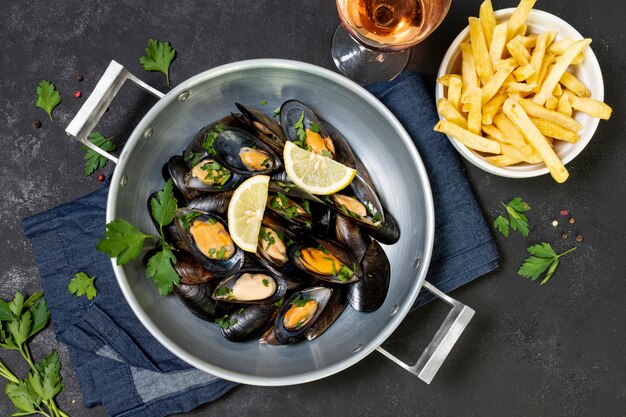 Delicious mussel shells with french fries