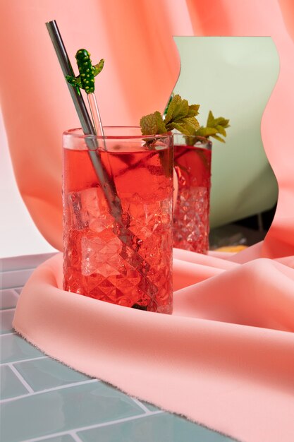 Free Photo delicious negroni drink with mint on cloth