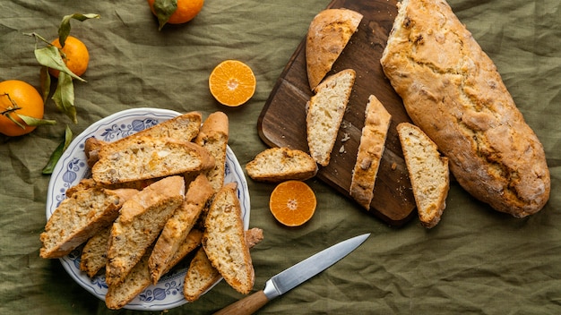 Delicious orange bun on table