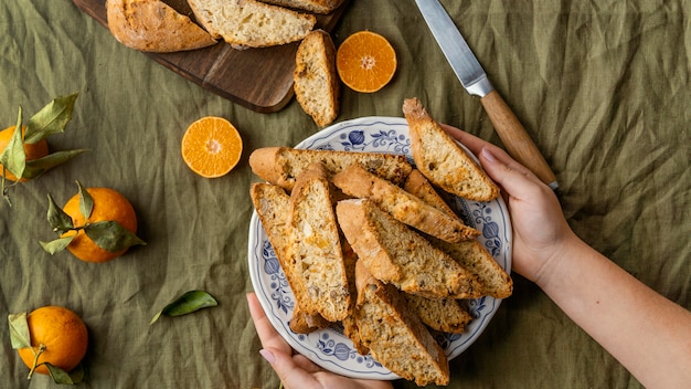 Free photo delicious orange bun on table