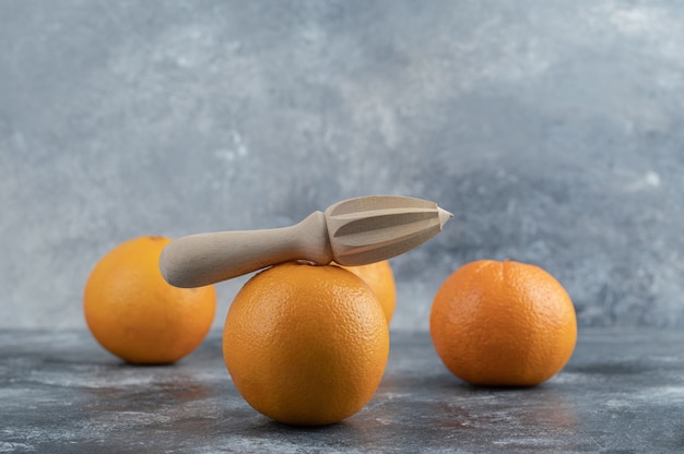 Free photo delicious orange fruits on marble table.