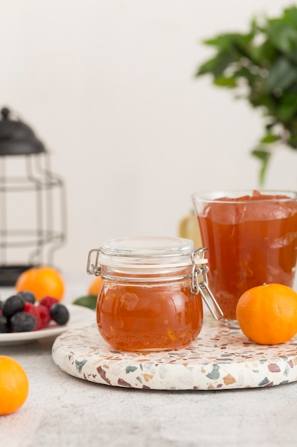 Free photo delicious orange homemade jam in jar