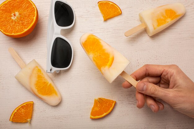 Delicious orange ice cream pop stickles