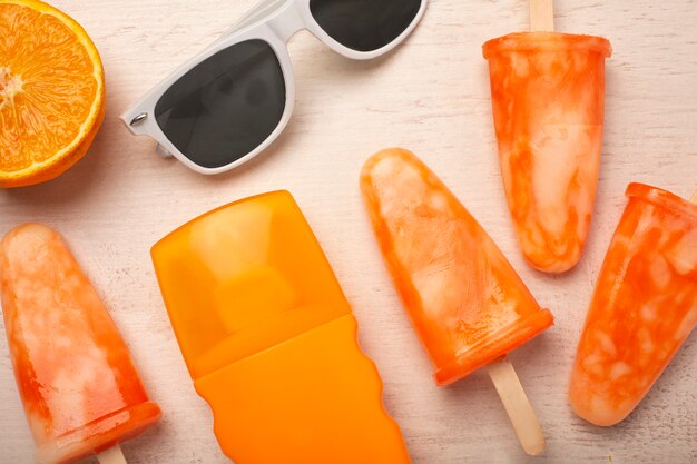 Delicious orange ice cream pop stickles