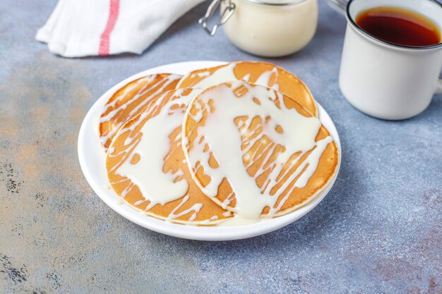 Delicious pancakes with condensed milk.