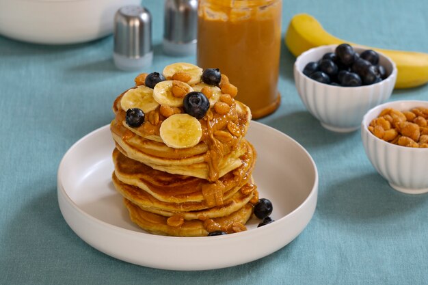 Delicious pancakes with peanut butter arrangement