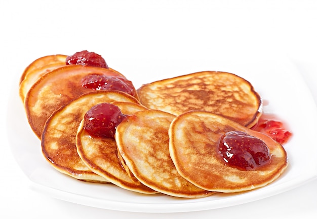 Delicious pancakes with strawberry jam