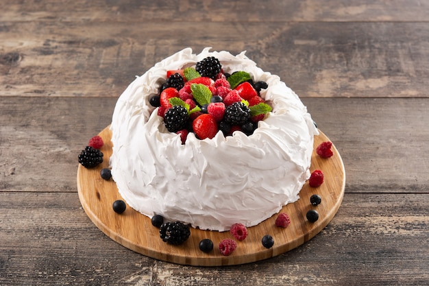 Delicious Pavlova cake with meringue topped and fresh berries