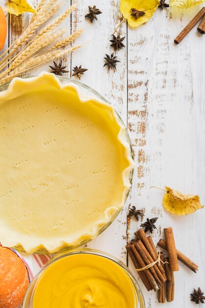 Delicious pie and pumpkin top view