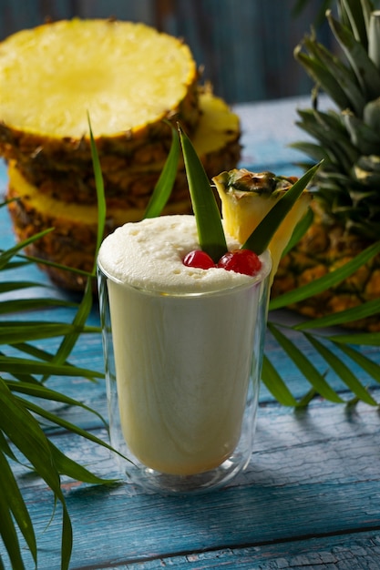 Free photo delicious pina colada cocktail  with leaves