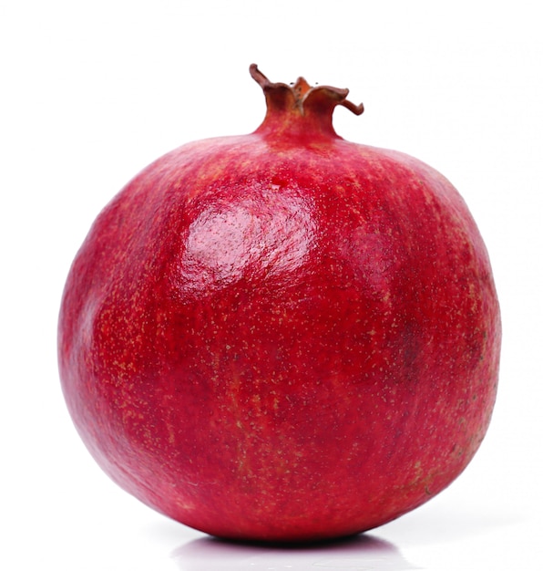 Delicious pomegranate on white