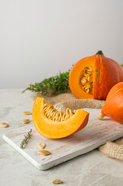 Free photo delicious pumpkin on wooden board