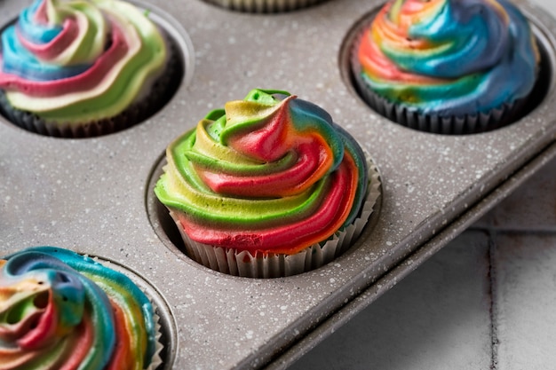 Free photo delicious rainbow cupcake still life