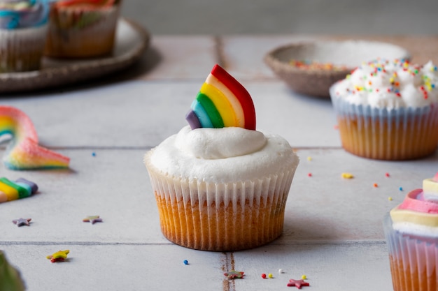 Delicious rainbow cupcake still life