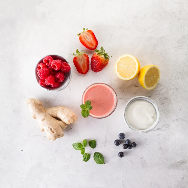 Delicious red smoothie with ingredients