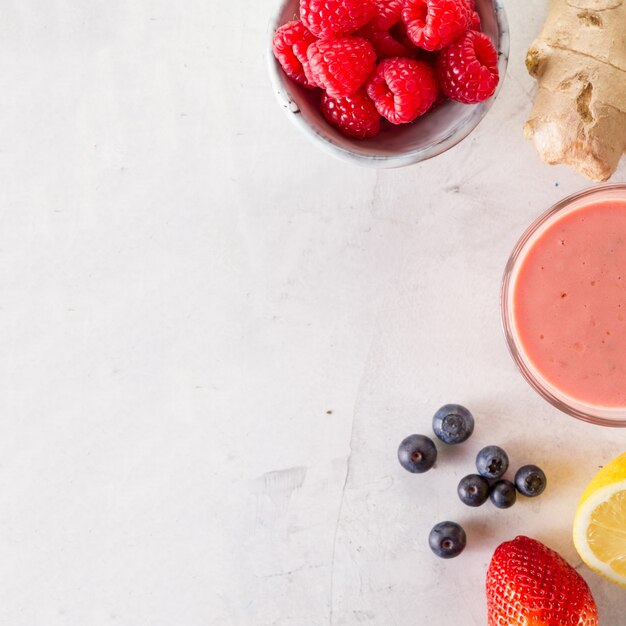 Delicious red smoothie with raspberries