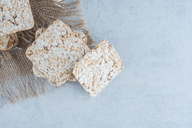 Delicious rice crispy treats on marble.