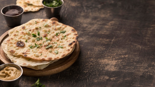 Delicious roti arrangement on the table with copy space