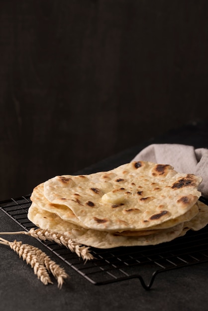 Free photo delicious roti assortment on the table with copy space