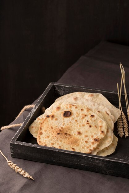 Delicious roti assortment on the table with copy space