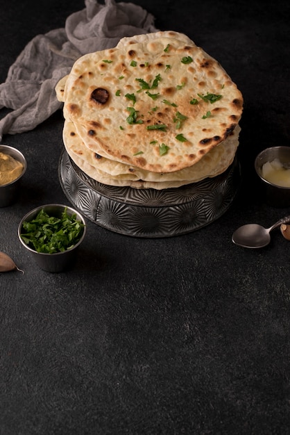 Delicious roti assortment on the table with copy space