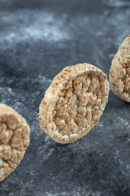 Delicious round crispbread on marble.