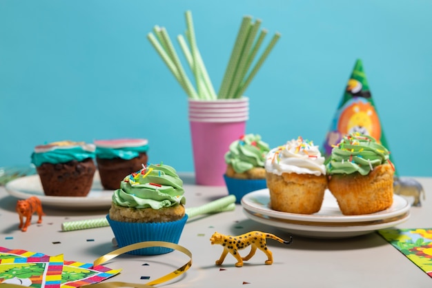 Free photo delicious safari party cupcakes arrangement