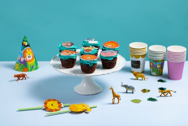 Free Photo delicious safari party cupcakes arrangement