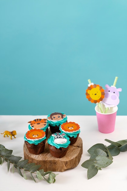 Free photo delicious safari party cupcakes arrangement