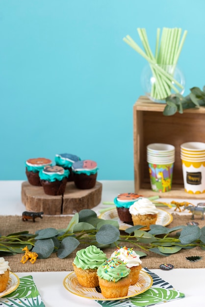 Free photo delicious safari party cupcakes arrangement