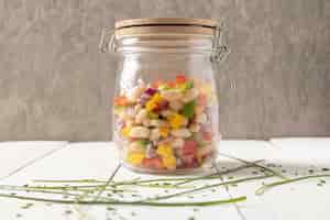 Free photo delicious salad bean in a jar front view