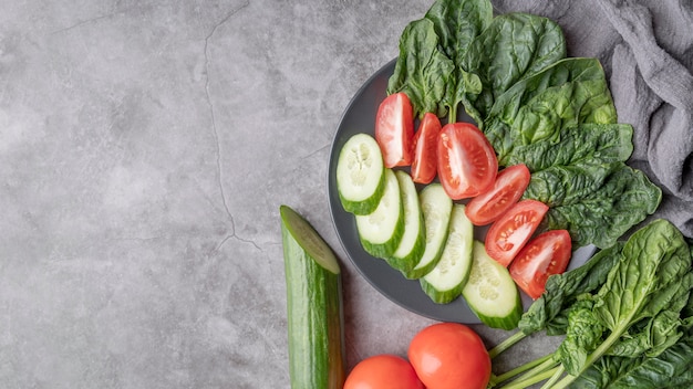 Free Photo delicious salad with organic vegetables with copy space