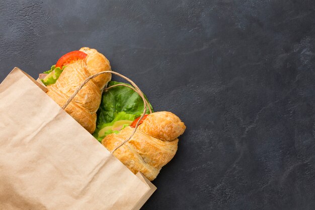 Delicious sandwiches in paper bag