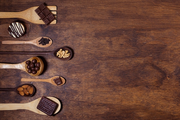 Delicious snack assortment on spoons