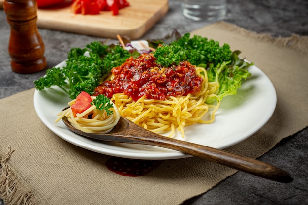 Delicious spaghetti served with beautiful ingredients.