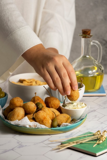 Free photo delicious spanish croquettes composition