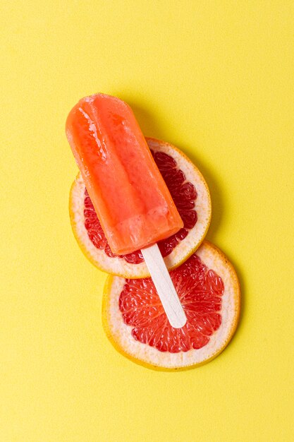 Delicious summer popsicle with slices of grapefruit