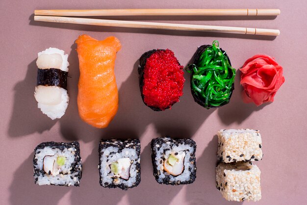 Delicious sushi rolls for sushi day on table